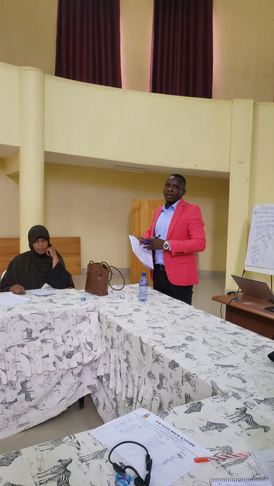 SELMATRAC researcher leading an enumerator training session for the Comfrey Utilization Project in Kajiado, Kenya
